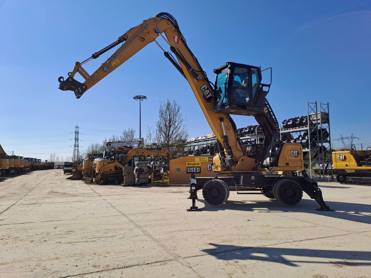 CAT MH3024 - Grävmaskin på däck: bild 1 CAT MH3024 - Grävmaskin på däck: bild 1