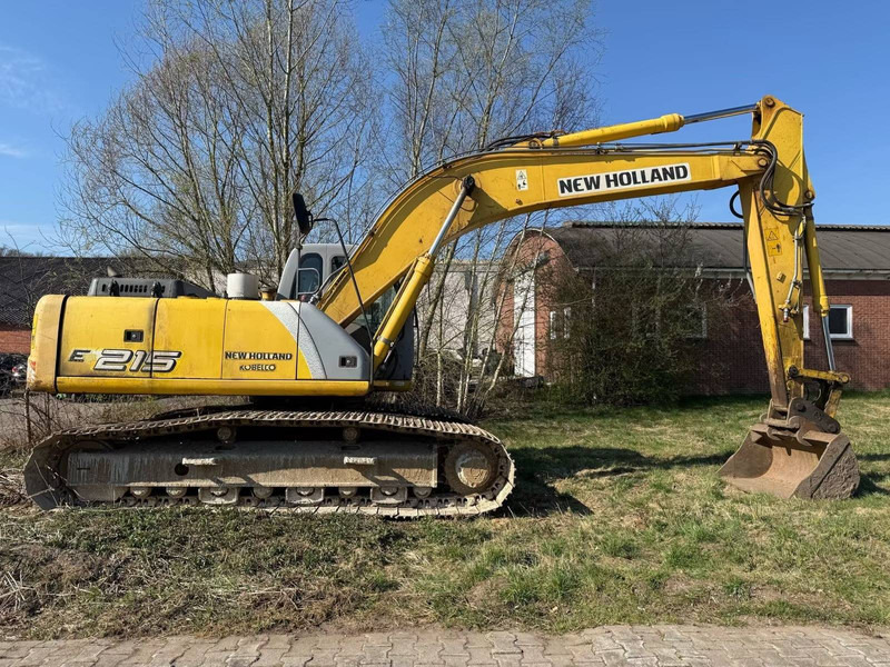 New Holland E215 - Bandgrävare: bild 1 New Holland E215 - Bandgrävare: bild 1