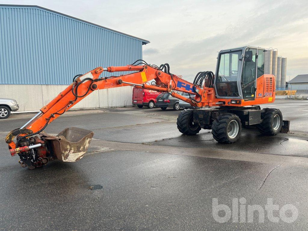 Hitachi FH 90 W - Grävmaskin på däck: bild 1 Hitachi FH 90 W - Grävmaskin på däck: bild 1