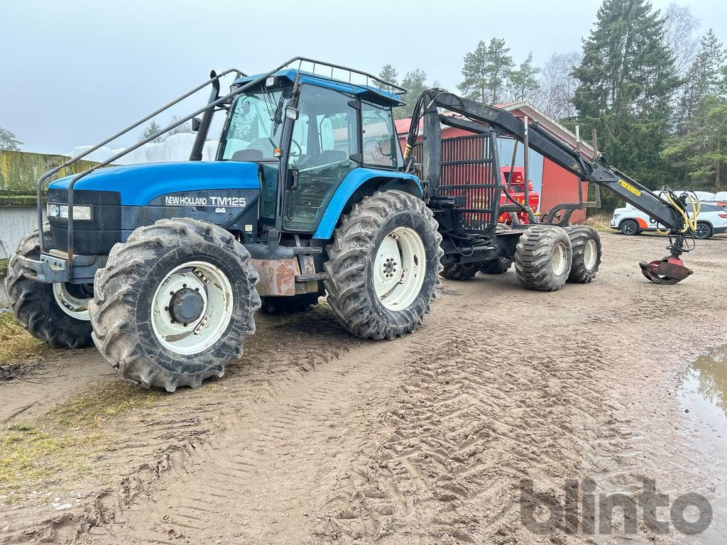 NEW HOLLAND TM 125 4WD Skogsvagn - Traktor: bild 1 NEW HOLLAND TM 125 4WD Skogsvagn - Traktor: bild 1